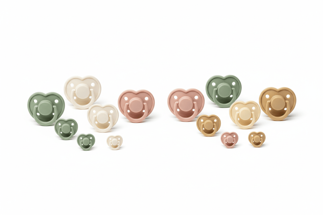 Baby pacifiers in different sizes and materials - silicone and natural rubber latex soothers in pastel Scandinavian colors showing orthodontic and round teat shapes on white background