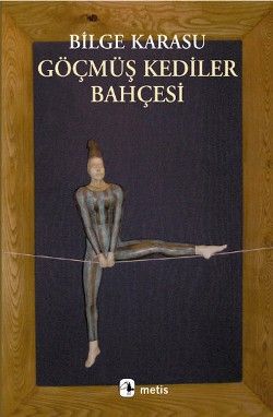 Göçmüş Kediler Bahçesi - Metis Yayınları Kitap